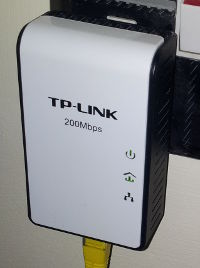 A TP-Link TL-PA211 connected to the wall socket