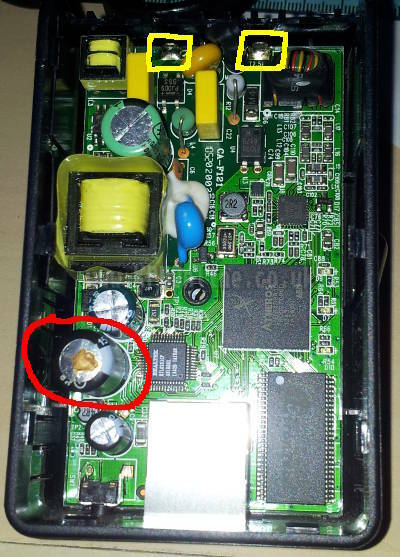 An opened TL-PA211 showing the circuir board and components